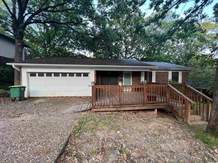 **FIXER UPPER**3 bedroom 2 full bath home in the heart of North Little Rock. Kitchen has been completely remodeled and master bathroom. Sunroom was added before seller purchased home. Double Garage. Large laundry room. Seller is unsure of dates on HVAC and Roof. SEE REMARKS!! SHELVES IN GARAGE DO NOT REMAIN WITH PROPERTY.