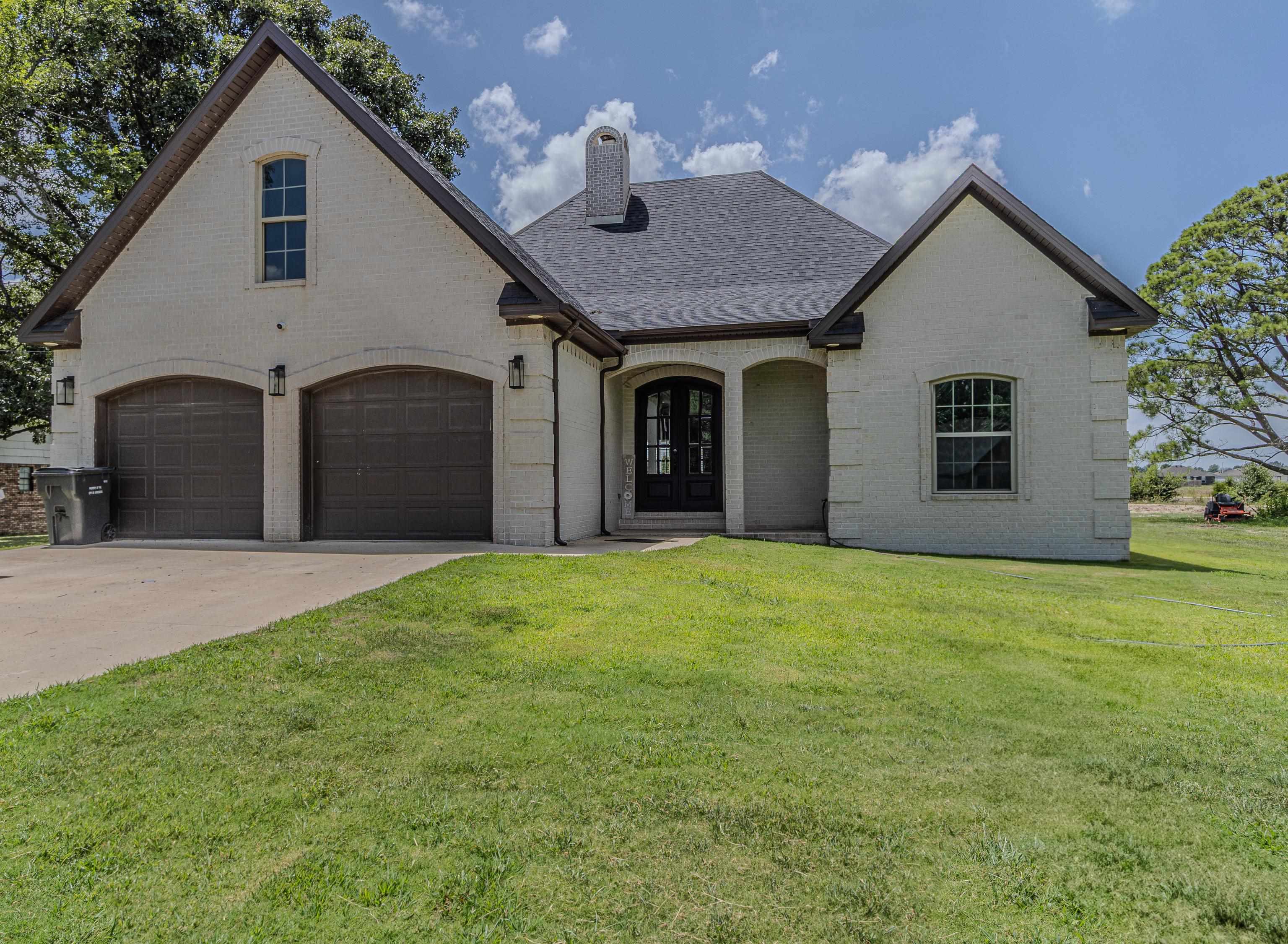 Stunning home in the Nettleton School District! This all-electric 4 bedroom, 3 bathroom home offers 2,413 square feet of living space on a spacious half-acre lot. Designed with quality and functionality in mind, it features porcelain tile throughout, granite countertops, and stylish shaker cabinets in a large, open kitchen. Enjoy the charm of brick arches on both the front and back porches, a masonry wood-burning fireplace, and the added safety of a built-in safe room. The huge bonus room provides flexible space for a playroom, office, or second living area. Additional features include:Brick exterior, Spacious layout, High-end finishes Move-in ready and built to impressāschedule your showing today!