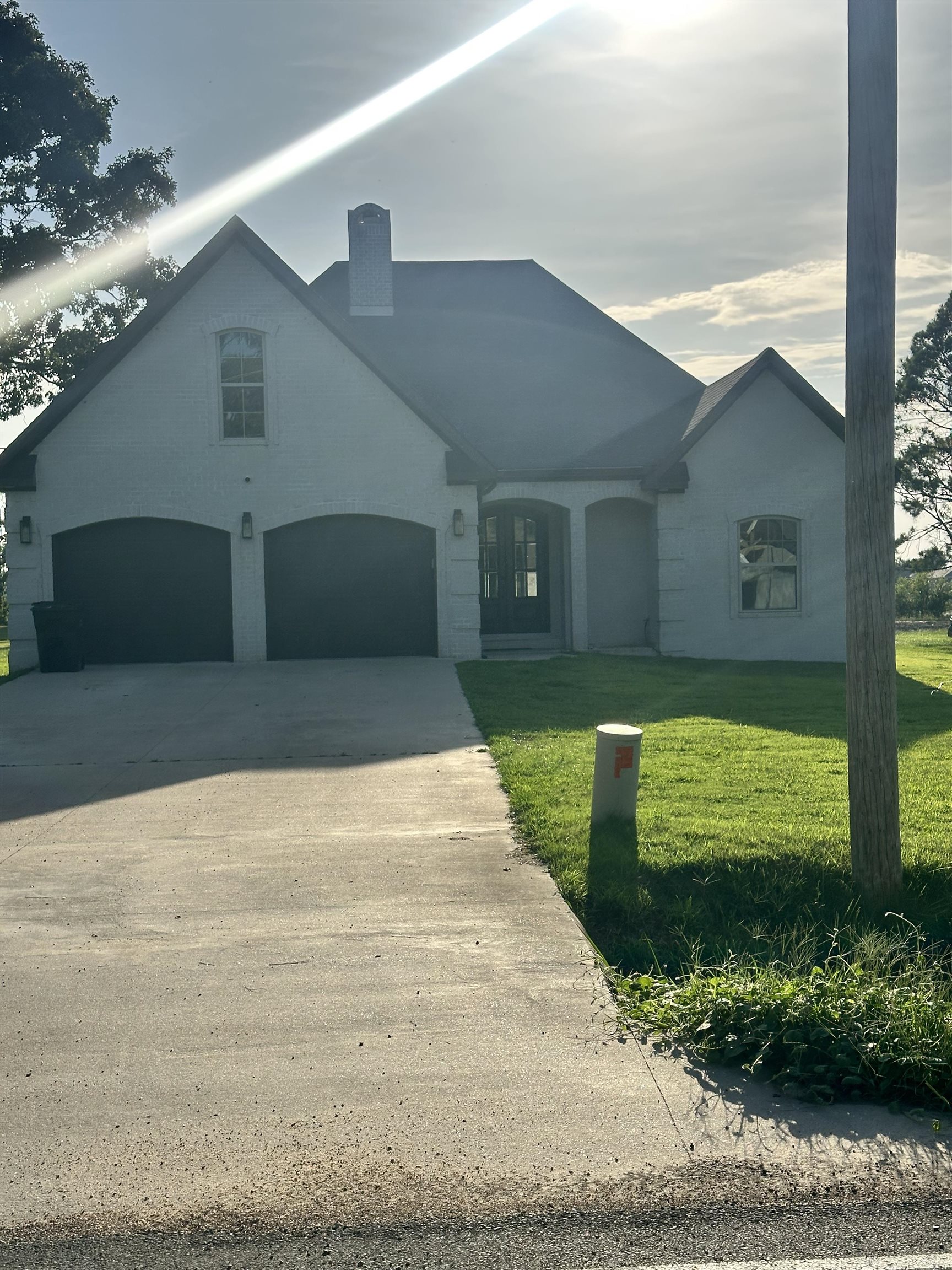 Stunning home in the Nettleton School District! This all-electric 4 bedroom, 3 bathroom home offers 2,413 square feet of living space on a spacious half-acre lot. Designed with quality and functionality in mind, it features porcelain tile throughout, granite countertops, and stylish shaker cabinets in a large, open kitchen. Enjoy the charm of brick arches on both the front and back porches, a masonry wood-burning fireplace, and the added safety of a built-in safe room. The huge bonus room provides flexible space for a playroom, office, or second living area. Additional features include:Brick exterior, Spacious layout, High-end finishes Move-in ready and built to impress—schedule your showing today!