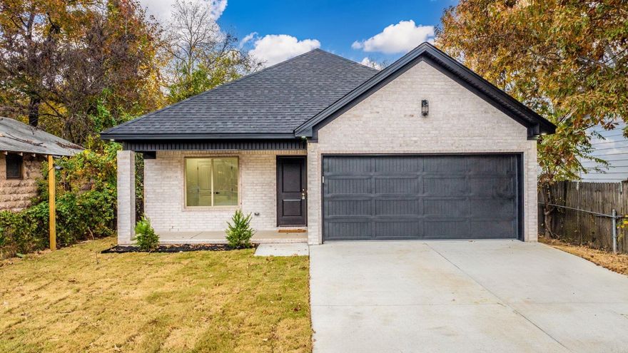 Beautiful home with an antiqued all-brick, low-maintenance exterior, dark soffit and fascia accents, covered front porch with wood-lined ceiling, under-eave lighting, and a 2-car garage with keyless entry. Inside, wide-plank luxury vinyl flooring, custom crown, trim, and recessed lighting run throughout. The kitchen features custom cabinetry with granite counters, tile backsplash, counter-bar seating with pendant lighting, Whirlpool Black appliances, 5-burner gas stove, and a walk-in pantry. The open living area includes built-in shelving, large windows, and access to the backyard. The master suite offers a spacious bedroom, walk-in closet with built-ins, and a master bath with granite vanity and a custom tile walk-in shower. Additional bedrooms include double-door closets with built-ins and easy access to a full hall bath with granite vanity and tub/shower combo. Large laundry room. The fenced backyard includes a concrete patio and ample privacy.