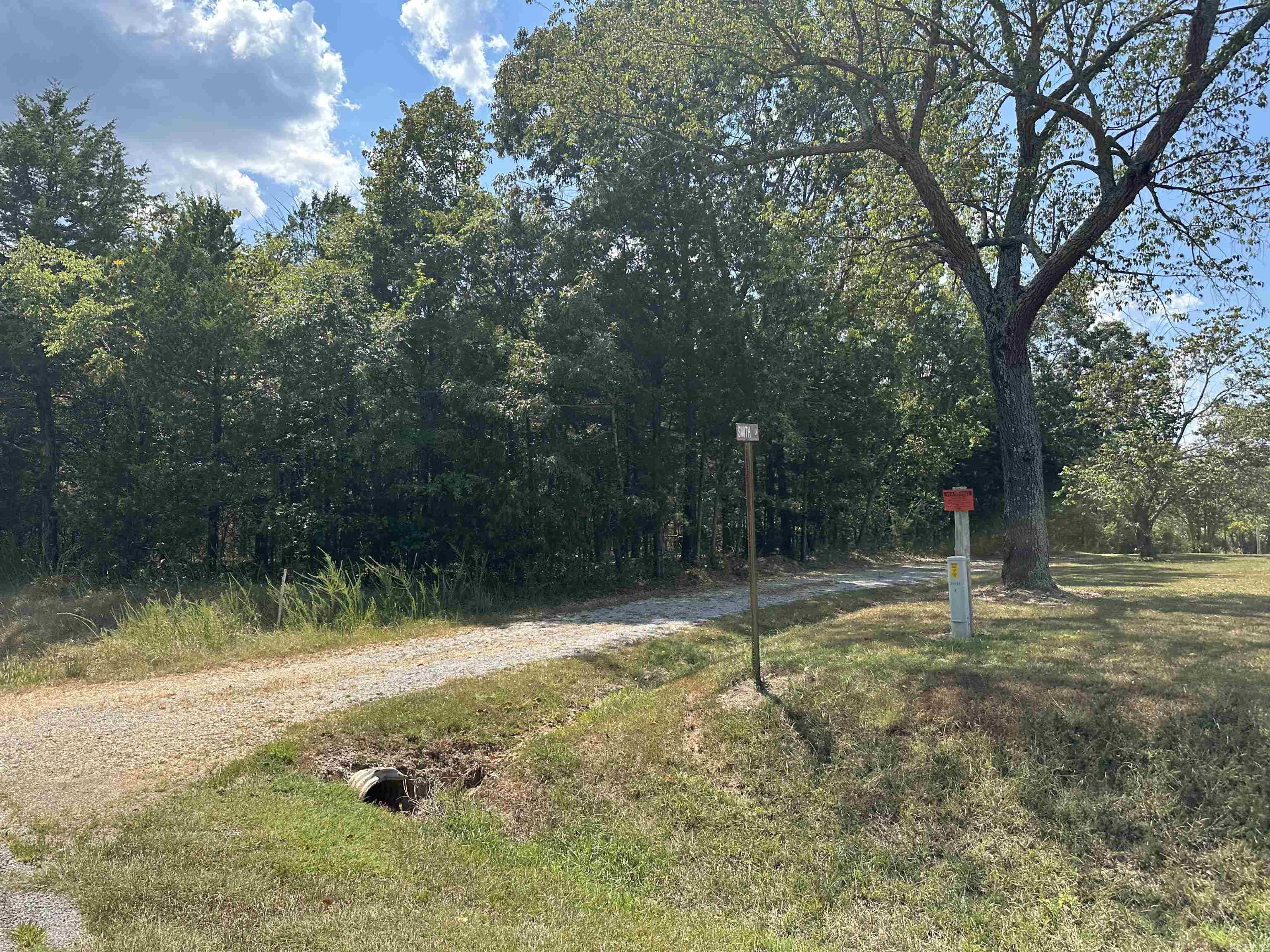 Great 2.05 acre m/l tract located right on HWY 125 N in Peel, AR. With highway frontage and east access, this property is an excellent spot for a home, cabin or small getaway. Mostly wooded with plenty of shade trees and natural beauty, it offers privacy while still being close to Bull Shoals Lake and all the outdoor recreation the area has to offer. Convenient location with endless potential-don't miss this one!