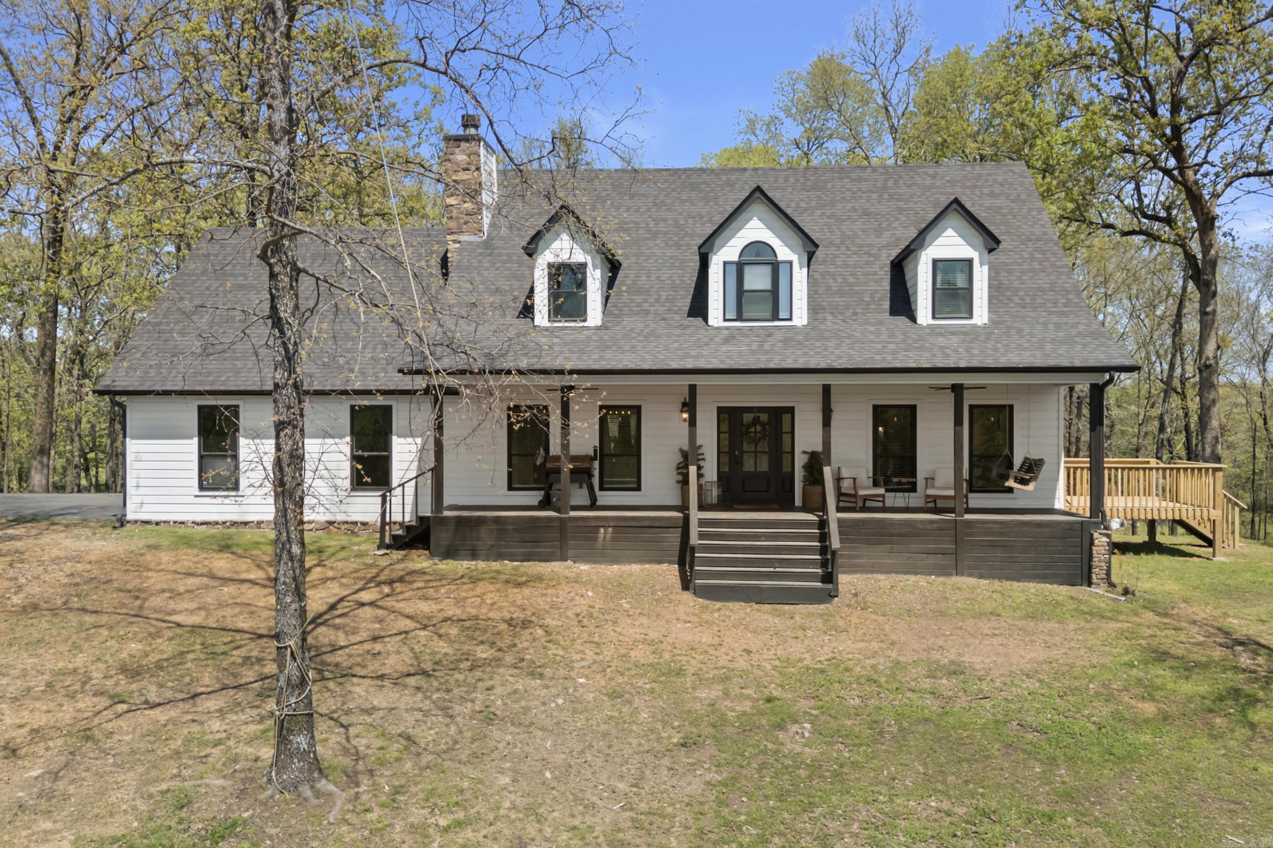 Welcome to your Dream Home in the Country! This Beautifully updated 4 Bedroom home sits on a picturesque 4.86 Acres with Breathtaking views from your huge Front Porch- Perfect for morning coffee or evening Sunsets. Inside, you'll find all New Fresh Updates to include New Paint & Flooring throughout, Quartz countertops (kitchen & Bath), new Stairs & Railing, to name a few! The Kitchen is a Chef's Dream & Features High End Appliances, Gas Cooktop & Large Dining Room! The spacious Living area showcases a Stunning floor-to-ceiling Rock Fireplace that creates a cozy & elegant focal point. Upstairs you'll find a Large Loft area and Flex Space & Oversized 4th Bedroom with private 1/2 Bath, that can easily function as a game room or 2nd Living Area for kids! Step outside & experience the Peace and Beauty of nature, with abundant wildlife & Room to Roam! The outside Shop offers extra space for hobbies or equipment making this property as functional as it is Beautiful! Whether you're entertaining, relaxing, or just soaking in the view, this home offers the perfect blend of comfort, style, & country charm. Don't miss your chance to own this one-of-a-kind property-Schedule your showing today!