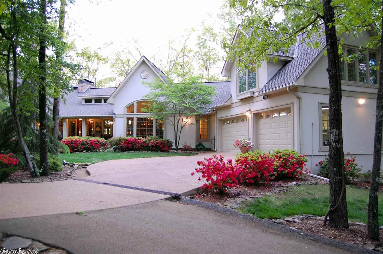 Truly your piece of Paradise! 18 Acres of Greers Ferry Lake front property with custom home, boat slip w/boat lift! 5-6 Bdrms, 6 ba, hardwood floors, 3 fireplaces (1 is floor to ceiling stone), 6" walls, 8" poured concrete basement walls, all interior walls insulated for temp control and sound supression. Please see attached sheet for amenities, plat and suggested division of 13 acres after sale.Property can be purchase with home and 13 Acres for $2,300,000. Lot 6 which is 5.60 acres is listed $428,000.