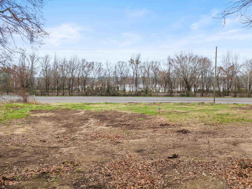 Prime commercial LOT spanning approximately 0.75 acres (exact size to be determined by new survey and parcel split) with excellent frontage on Malvern Road (Hwy 270). This high-visibility location boasts an ARDOT traffic count of 19,000 vehicles per day and is conveniently situated less than a mile from the bypass and just 1.5 miles from Lakeside School. City water and sewer are available on Indian Springs Road, enhancing development potential. Don’t miss this exceptional opportunity in a rapidly growing area!