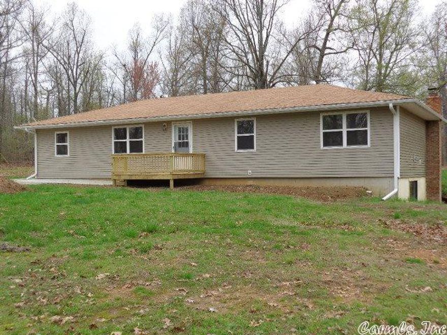 Lots of home for the money in the Ozark Foothills! This 4 plus bedroom, 2.5 bath home on 5 acres has over 2,800 sq. ft. of heated & cooled area including the partially finished basement. It has just been remodeled. There is a high efficiency heat pump plus a central wood furnace. Sit on your deck and watch the deer and turkey come thru your yard. Great location - only 5 minutes to Ash Flat. READY TO MOVE INTO!. PRICED AT BELOW $31 PER SQ. FT.