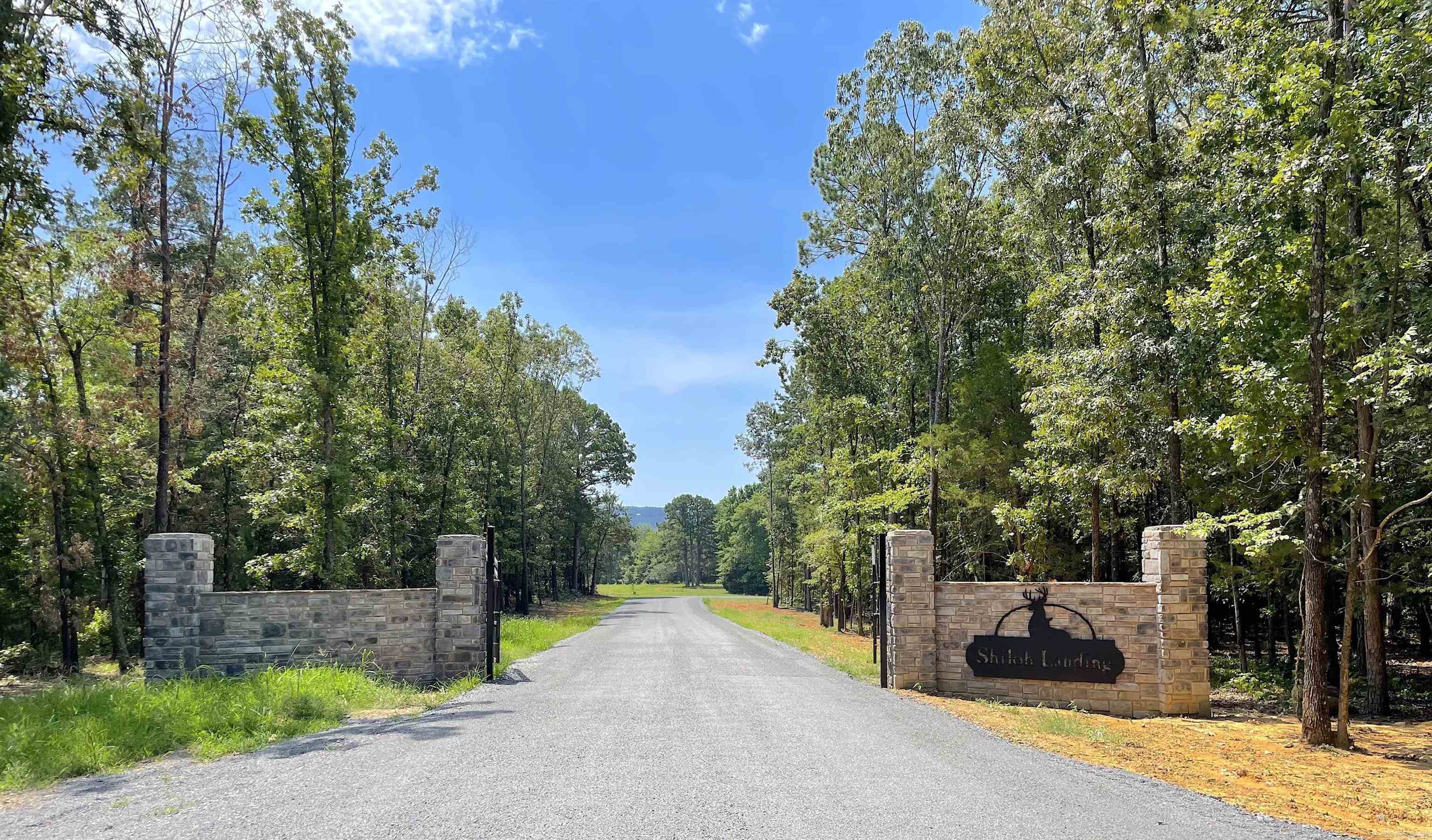 Rare opportunity-premier lakefront lots! Easy walk to the water, beautiful rock shoreline & gorgeous tall trees make this subdivision look like a park. Shiloh Landing is so close (1/2 mile), you could walk or ride your side-by-side to your boat. Underground utilities. There is a park area with pavilion & picnic tables & a nature trail for the subdivision! Subdivision road has been chip & sealed & the city has paved Stone Drive. Gated subdivision. HOA will be formed at a later date. C&Rs will have a few changes.Please confirm taxes. Video and two photos are of nature trail. Please confirm most recent plat in case there have been changes.