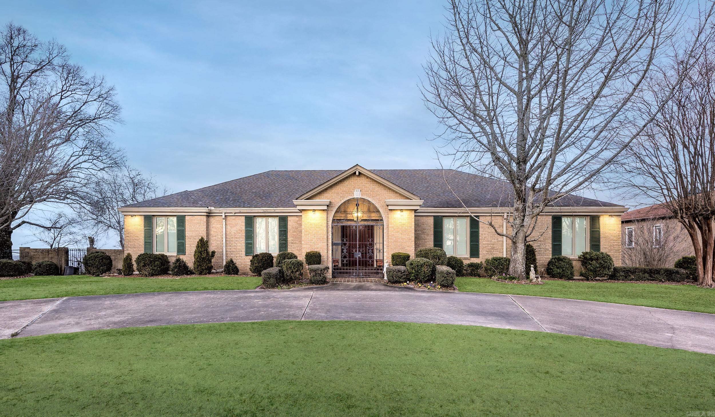 Experience luxury living at 13100 Rivercrest Drive, a prestigious home with breathtaking panoramic views of the Arkansas River. Built with unparalleled craftsmanship, this 6,234 sq. ft. estate offers 3 expansive living areas, 4 oversized bedrooms, and an office that doubles as a 5th bedroom. The chef's kitchen features a Sub-Zero refrigerator, while a second kitchen on the lower level adds convenience for entertaining. The home's outdoor living spaces are simply stunning, with multiple terraces overlooking the river, a beautiful pool, and a walk-out lower level designed for relaxation. Inside, custom millwork and abundant storage enhance the thoughtfully designed floor plan. A 4-car garage, circle drive, and a dedicated workshop/craft room add practicality to the luxury. Built like a fortress, this exceptional home offers a rare opportunity to own one of Rivercrest's finest properties. Schedule your private showing today. (See Agent Remarks)