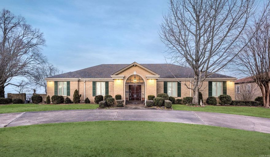 Experience luxury living at 13100 Rivercrest Drive, a prestigious home with breathtaking panoramic views of the Arkansas River. Built with unparalleled craftsmanship, this 6,234 sq. ft. estate offers 3 expansive living areas, 4 oversized bedrooms, and an office that doubles as a 5th bedroom. The chef's kitchen features a Sub-Zero refrigerator, while a second kitchen on the lower level adds convenience for entertaining.  The home's outdoor living spaces are simply stunning, with multiple terraces overlooking the river, a beautiful pool, and a walk-out lower level designed for relaxation. Inside, custom millwork and abundant storage enhance the thoughtfully designed floor plan. A 4-car garage, circle drive, and a dedicated workshop/craft room add practicality to the luxury.  Built like a fortress, this exceptional home offers a rare opportunity to own one of Rivercrest's finest properties.  Schedule your private showing today.   (See Agent Remarks)