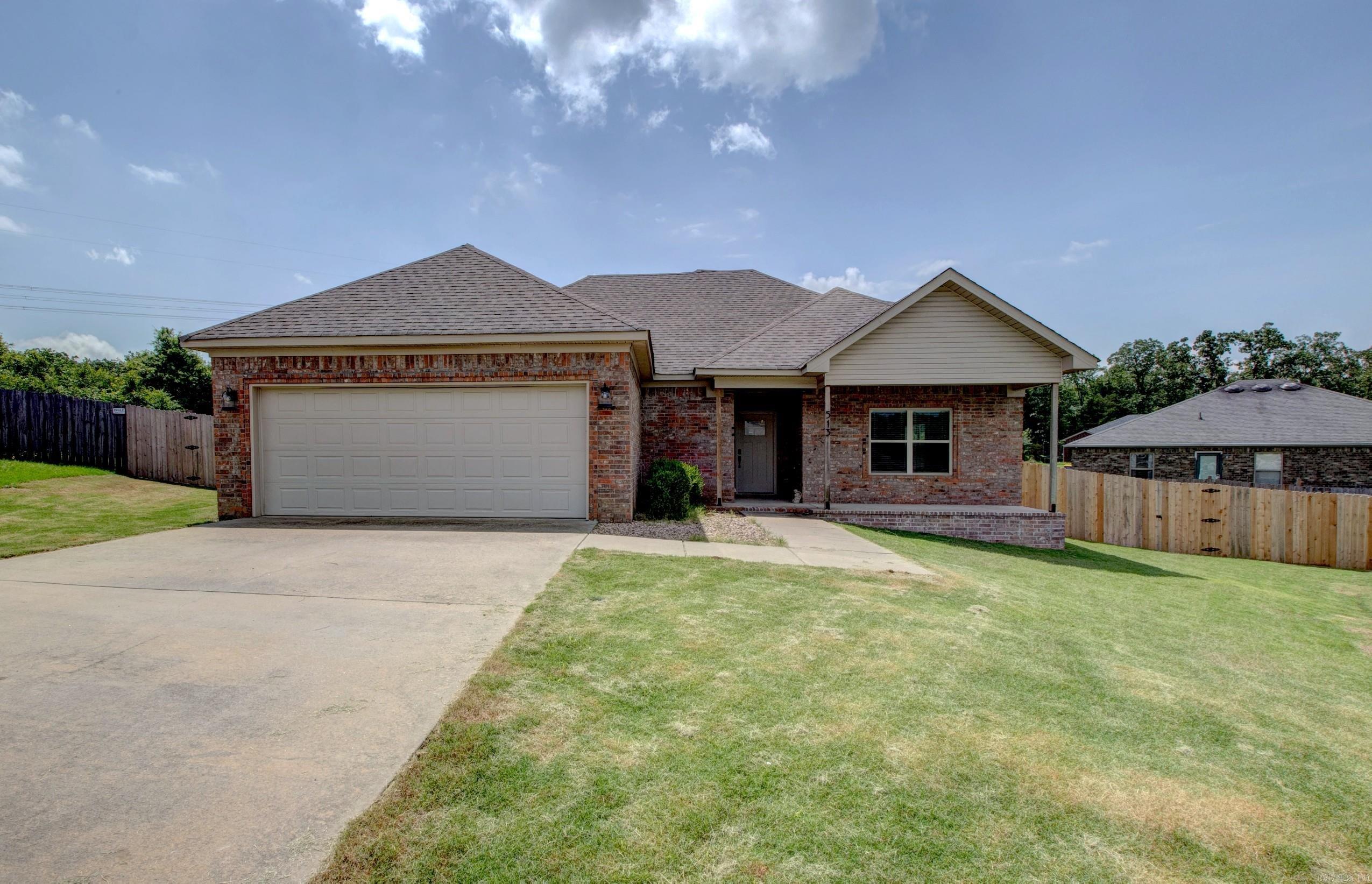 Conveniently located in the Pleasant Forest Subdivision, this beautiful like-new home offers a perfect blend of charm and modern amenities. The kitchen features granite counter tops with a large island, walk-in pantry and a new dishwasher. You will love the oversized laundry room with a folding table, ton of storage and the washer and dryer will convey. The primary on-suite features a tiled walk-in shower, soaker tub, double vanity and a huge walk-in closet with built-in storage. Step outside with access from your primary bedroom to the spacious covered back porch for a quiet morning or relaxing evening. You can beat the Arkansas heat and humidity this summer with the NEW HVAC that was installed this year! Zoned Cabot schools, located in a family friendly neighborhood and close to shops and popular restaurants! You can have that country feel with the urban convenience. Call today to schedule your showing! AGENTS SEE REMARKS!!
