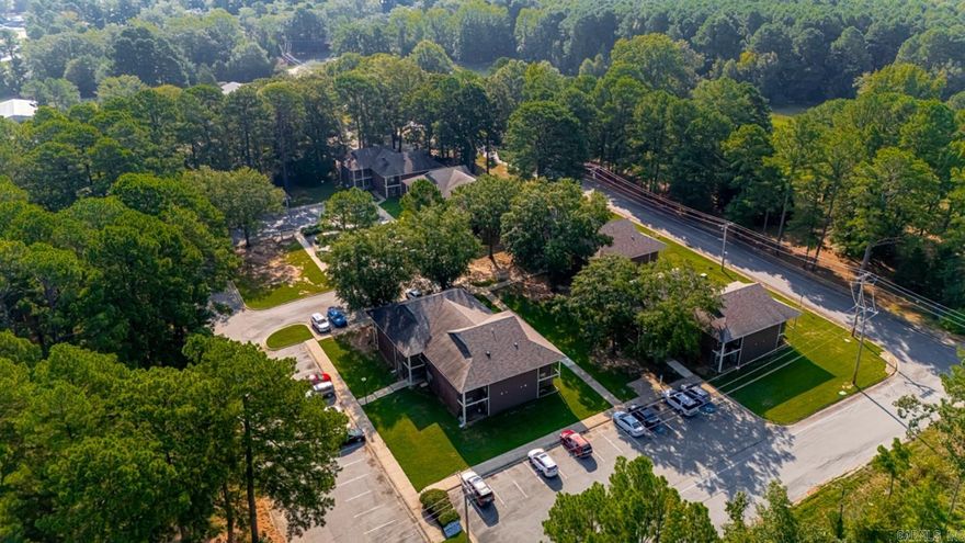 Westside Village Apartments is a well-maintained, 40-unit garden-style community situated on ±3.81 acres at 1810 Bishop Road in Bryant, AR—one of Central Arkansas’ fastest-growing suburbs with immediate access to I-30, Bishop Park, and the Alcoa/Reynolds retail corridor. The property features a balanced unit mix of 16 one-bedroom flats (±646 SF) and 24 two-bedroom flats (±834 SF), all-electric systems, central HVAC, tenant paid water, on-site laundry, and proximity to Bryant’s highly rated school district, making it a proven choice for stable workforce housing. Current market rents (~$735 for 1BR; ~$805–$855 for 2BR with washer/dryer connections) remain below Bryant’s averages (˜$942 for 1BR; ˜$1,182 for 2BR), presenting immediate mark-to-market growth potential. Recent ownership has invested in significant upgrades, including the installation of stone countertops in most kitchens, replacement of the majority of HVAC units and water heaters, new ceiling fans, and updated appliances—positioning the property for both strong in-place cash flow and additional value-add upside.