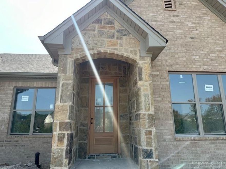 Welcome home to West Little Rock's latest destination for luxury living, Edgewood! Surrounded by lush landscaping and mature trees, the Edgewood community provides a secluded atmosphere while being just moments away from your favorite shopping and dining spots in West Little Rock. Another perk of this desirable neighborhood? NEVER MOW YOUR LAWN AGAIN! Lawn maintenance is included with your yearly fees! This gorgeous, attached home features a stellar open concept layout with designer curated finishes planned throughout. Enjoy a chef's kitchen with a large center island that flows perfectly into your spacious living area equipped with beautiful electric fireplace. Each home is separated by fire walls with sound cavities to create a soundproof lifestyle, ideal for your comfort & relaxation. Speaking of comfort & relaxation, the oversized back porch is sure to impress!  This gorgeous home is anticipated to be complete by December 2024