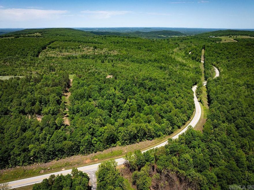Stunning lot nestled off of State Road 66 (AR66) with convenient access just outside of Oxley. This 9.5 acres features lush greenery and mature trees. We have quotes for a contractor to add a driveway culvert and clear part of the land to build your dream house. SELLER FINANCING available!