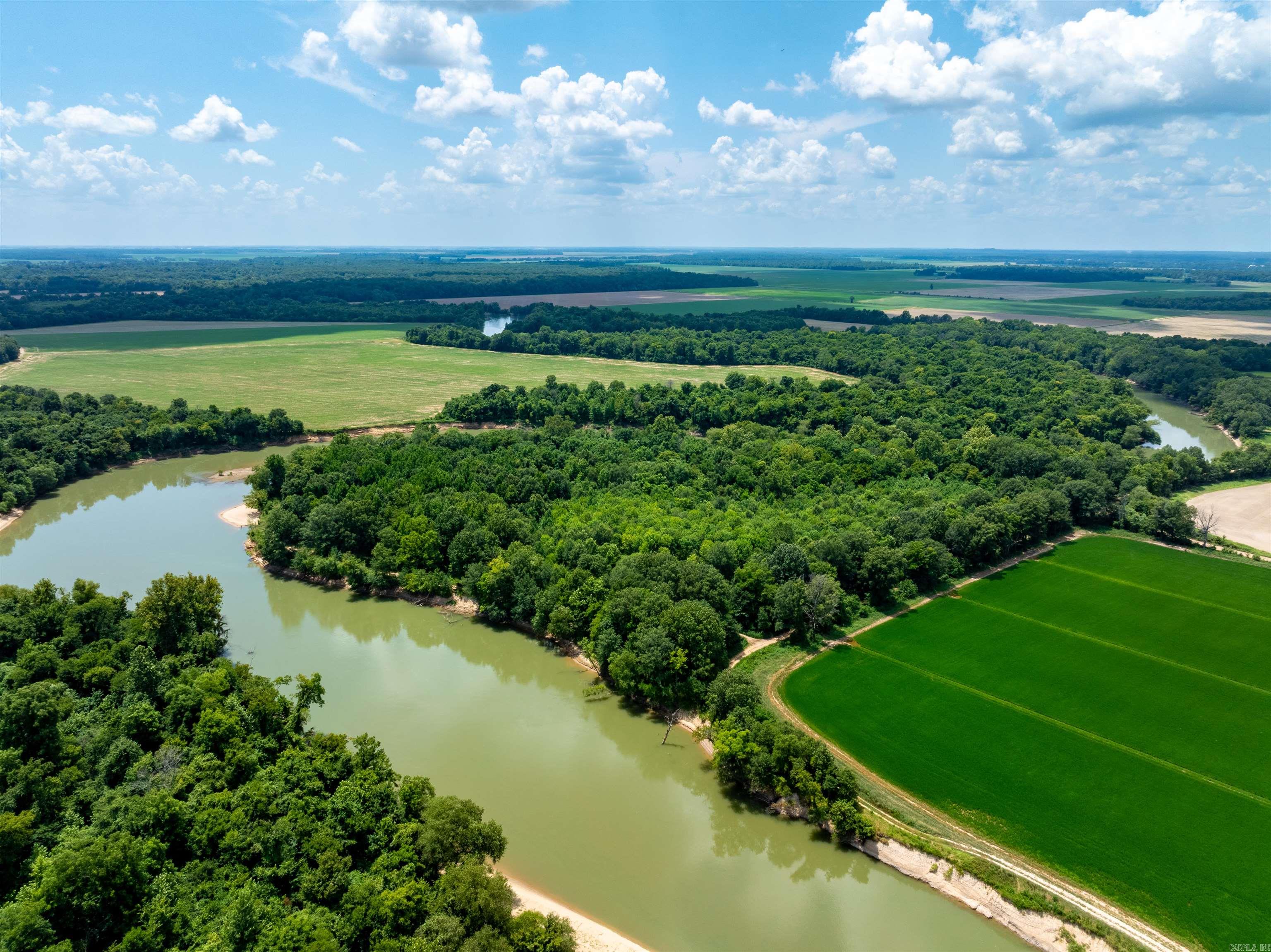 Owner Financing ā 9± Acre Riverfront Property on the Current River | Sharp County, Arkansas 3 Parcels Sold Together | No Restrictions Rare opportunity to own 9± acres of unrestricted riverfront land on the Current River, complete with direct river access, sandy bars, and owner financing available with only 10% down and owner will carry the note. This scenic, recreational retreat is the perfect canvas for your vacation cabin, RV site, tiny home, or off-grid getaway. Property is divided into three 3-acre parcels, being sold as one. Located on a peaceful stretch of river with mature shade trees, open clearings, and year-round access via gravel road. Enjoy swimming, kayaking, fishing, hunting, and relaxing in nature. Please note: No water or electric on site. Off-grid potential or future install. Highlights: 9± acres total | 3 parcels sold together Current River frontage with sandy beach area No restrictions ā Tiny homes, RVs, mobiles, hunting camps allowed Mature trees + cleared areas ready to build or camp Private & peaceful setting with outdoor recreation Gravel road access | Remote but reachable Owner financing available | 10% down required