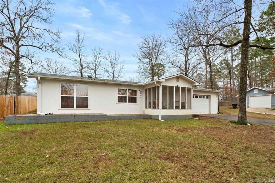 Charming 760 sq. ft. home with a partial lake view. This one bedroom, one bathroom home features include a one-car garage, newer roof  and is being sold as-is. You can take a small walk to the lake front, community park where you can enjoy swimming, fishing, grilling, sunsets or launch a boat. Perfect for a starter home, weekend retreat, or investment opportunity!