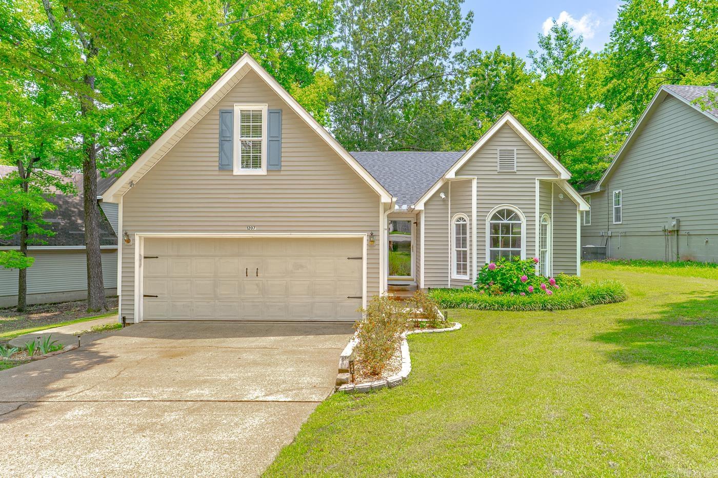 Welcome to Market 1207 Hunters Run Cove of Jonesboro, AR! The main floor features an open living and dining room area with a fireplace and wet bar, spacious kitchen, sunroom, and 4 bedrooms with 2 full bathrooms. The large primary bedroom features an en suite with a walk-in shower, closet, and linen closet. The 3 guest bedrooms are generously sized and share a full bathroom. Upstairs is an additional room with a closet that can be used as a 5th bedroom, office, or home gym. Recent improvements include: new shower stall in primary bathroom, windows, paint, and HVAC ducts. Relax in the sunroom or out on the deck overlooking the backyard. This stunning property has many upgrades while keeping its charm! Don't miss your chance to see this one!! Call today to set up your showing!