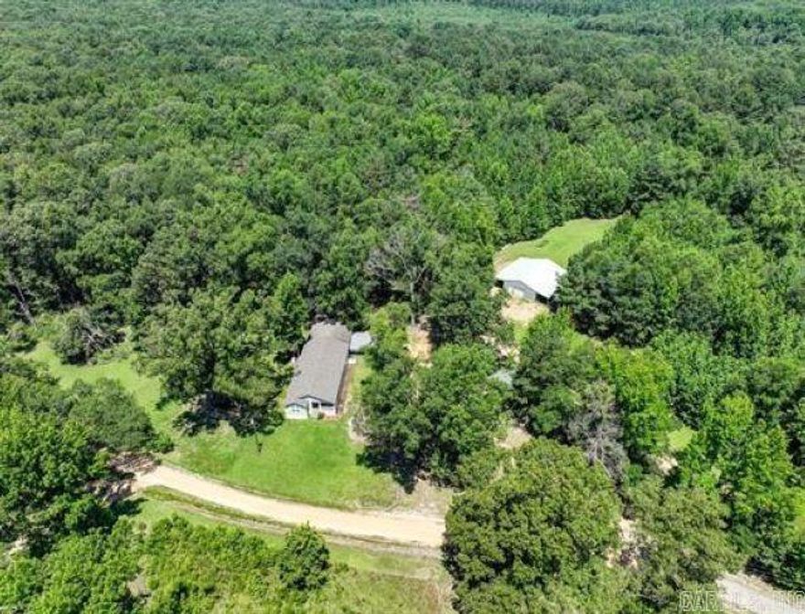 Wow, hard to find such a nice home with a large two-car garage and a huge shop with land for elbow room!  All four of these wants are wrapped up in one place. Yes, 14.52 acres + or -, approx 1500 sq. ft shop, approx 720 with the two-car garage. The home comes with a little fenced yard for pets or a garden. The home features a beautiful kitchen with ample cabinet space.  The shop is a dream come true with electricity, water, insulation, a half bath, a hot water heater, an inside drain already in place, a cooler room, garage doors at each end of the shop, 2 lien-tos, and water spickets that are located at each corner of the shop for a total of four of them! Seller will include the butane tank, the generator, and the big car port by the two car garage.  The items that do not convey or will be extra, is the 1 shed, the other car port, and the refrigerator in the kitchen. Fiber Internet is available. This is in the Star City School District. Measurements are encouraged.  Sellers will need a Delayed Occupancy. Do not go down Pinebergen Road or Gibb Anderson Road; those roads are not paved yet. The best way to get to the home is by getting on the Arrowhead Road if you are on Hwy 530.