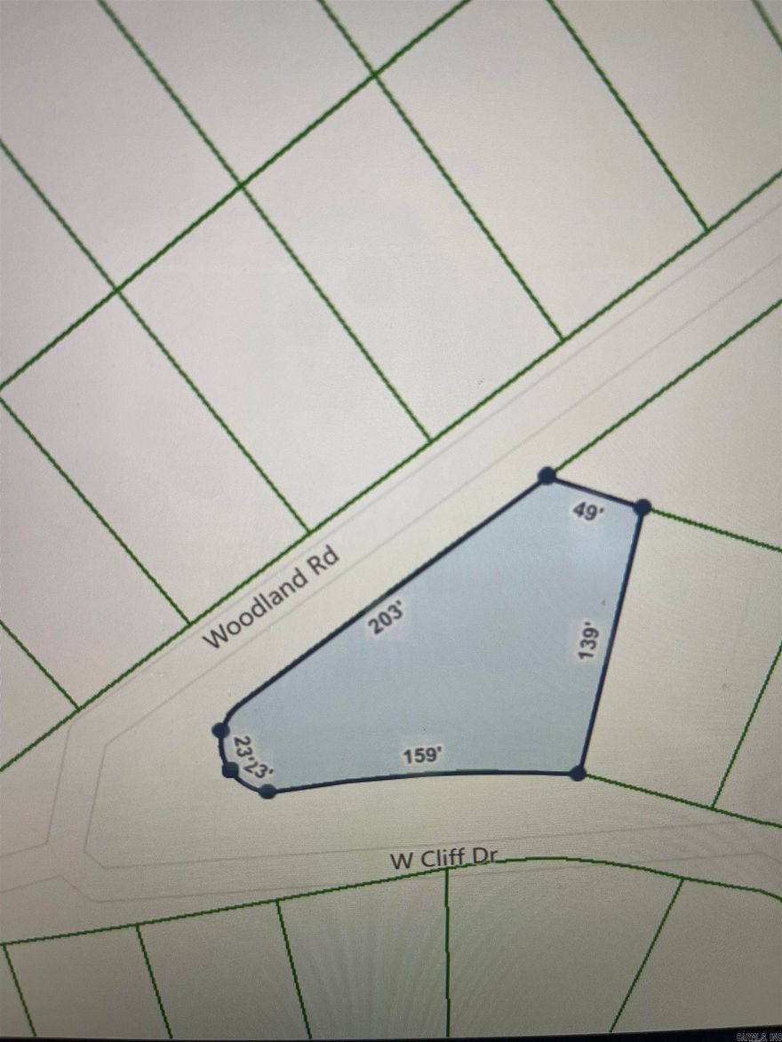 Welcome to your own slice of paradise in beautiful Fairfield Bay, Arkansas! This spacious vacant triangle shaped lot offers the perfect opportunity to build your dream home in one of the most desirable locations in the state, with access to a wealth of amenities.  Just minutes away from  stunning Greers Ferry Lake. Whether you're an avid fisherman, boater, or simply enjoy relaxing by the water, this location has something for everyone. But that's not all Fairfield Bay also offers a wide range of amenities to its residents, including 3 swimming pools, 2 18-hole golf courses, hiking and biking trails, ATV/UTV trails, pickleball and tennis courts, and a full-service marina. Whether you're looking for outdoor adventure, a friendly game of tennis, or a relaxing day by the pool, Fairfield Bay has you covered. The lot itself is generously sized and offers plenty of room for your custom-built home, as well as any additional amenities you desire. With easy access to utilities and services, including water, sewer, and electricity, you'll have everything you need to make your dream a reality.  Buyer to pay all closing costs and title insurance.