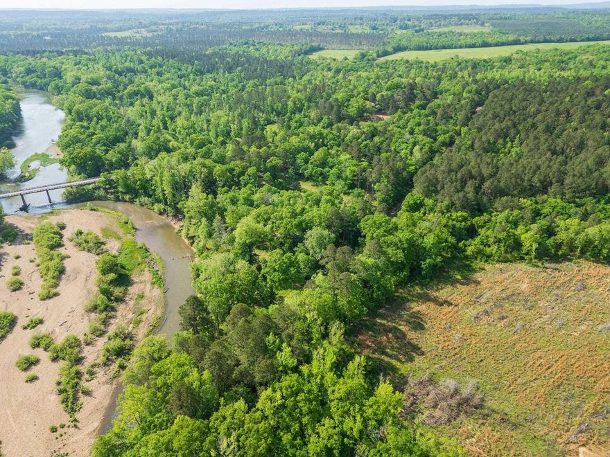 Caddo River Property! Gated 3.72 acres +/- on the Caddo River in Amity, Ar. (Clark County Ar.) right off Hwy 84E  Seller has done all the hard work! There is electricity, water, and septic system already in place. Seller also has a partially built conaire home two story, that you could finish as you like!. Property goes to the middle of river. You can fish and enjoy this great lifestyle everyday, not just vacation! Also, if you like to float, just take your canoe and put in on Hwy 182 and float down to your home and take out!  "Life is Good!"