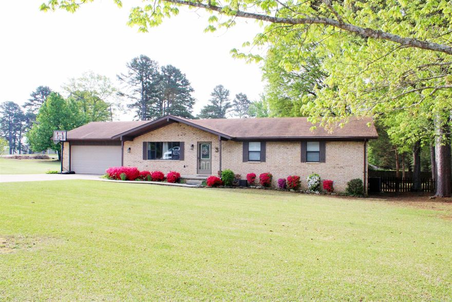 This 3 bedroom two bath home has so much to offer! Just a short walk to Heber Rec for the Historic and beautiful Greers Ferry Lake and a few short minutes to all the amenities that town has to offer! This home is nestled on a large corner lot of the Beloit Bay Subdivision. This home is well taken care of with two updated bathrooms, sunroom, garage, storage building, RV parking,  and a very spacious yard!