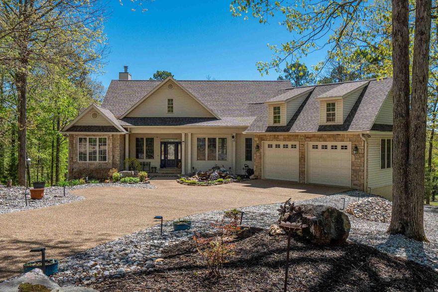 Imagine living at the end of a quiet cul-de-sac, where your backyard opens to not one—but two fairways of the beautiful Magellan golf course. Situated on just shy of a full acre, this property offers one of the largest golf course lots around, paired with a low-maintenance lifestyle to enjoy serene, private views!  This spacious 4-bedroom, 3.5-bath home features a thoughtfully designed layout. The main level boasts an open floor plan with a seamless flow between the living room, dining area, and kitchen—perfect for both everyday living and entertaining. A private office provides a quiet workspace & fantastic view. The primary bedroom offers a relaxing retreat with an en-suite bath. A second bedroom with its own bathroom is conveniently located on the main level on the other side of the home.  Downstairs, you’ll find a generous den/family room complete with a kitchenette—ideal for guests or multi-generational living. Two additional bedrooms, a full bath, and ample storage space complete the lower level. A golf cart garage w/extra storage adds to the home’s functionality. This property has been updated with numerous improvements, complete list on request.  AGENTS see REMARKS