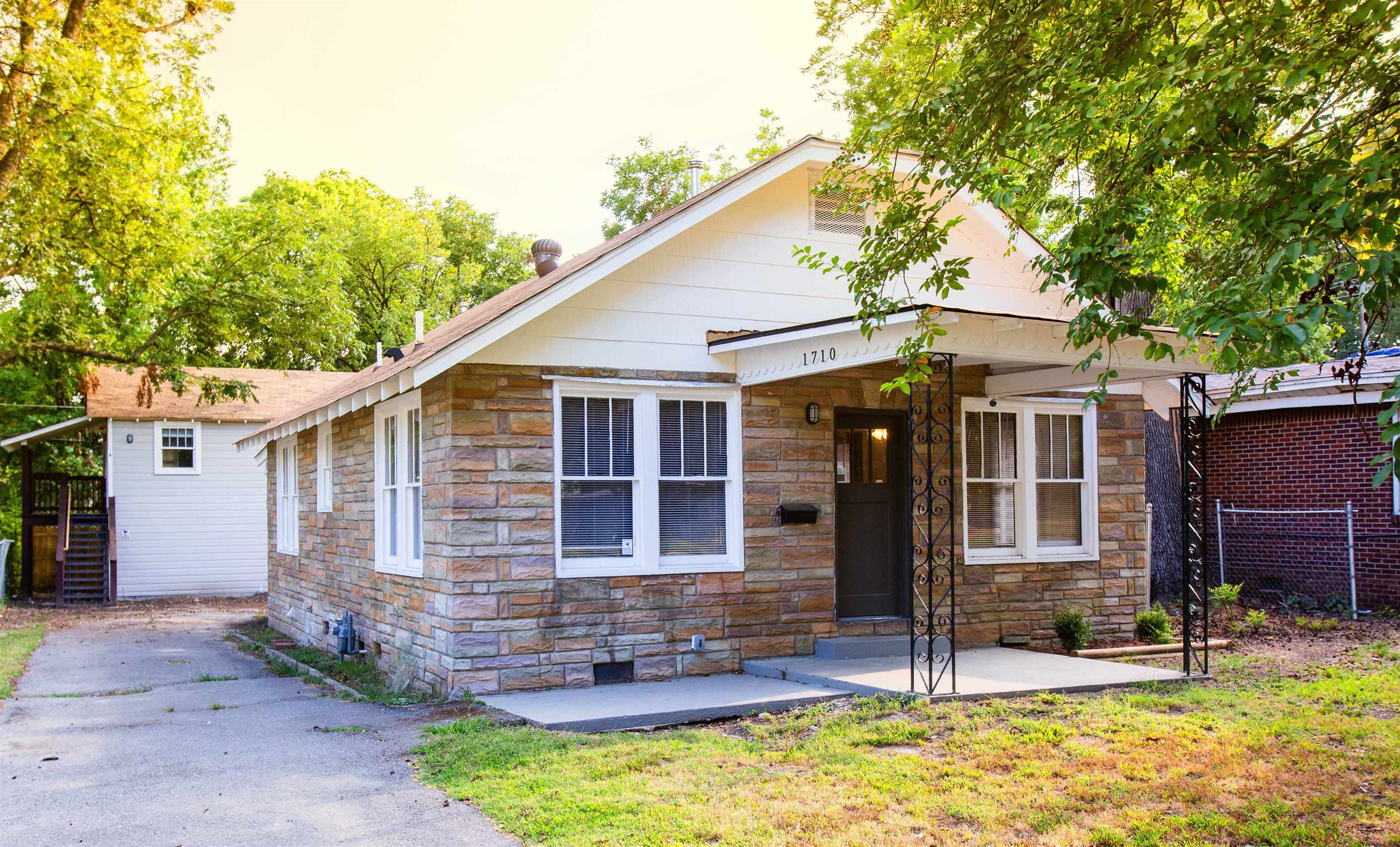 Completely renovated single family home with a duplex behind it. The home is 1710 West 18th St., is rented through 12/31/25 for $980/mo. Hot water heater from Dec '23 & furnace and air conditioner from Dec '23. The duplex is 1712 West 18th St. Units A & B. Unit A is rented through 11/30/25 for $525/mo, and Unit B is rented through 10/31/25 for $525/mo. Both 1712 Units A and B are studio apartments, with no separate bedrooms. Both have LVP flooring throughout. Hot water heater from 2023. Roofs are all less than 2 years old. Landlord pays water, sewer and trash, and it's billed back to residents. Landlord pays landscaping and pest control. Our repairs & updates make this a great investment property to maximize cash flow.