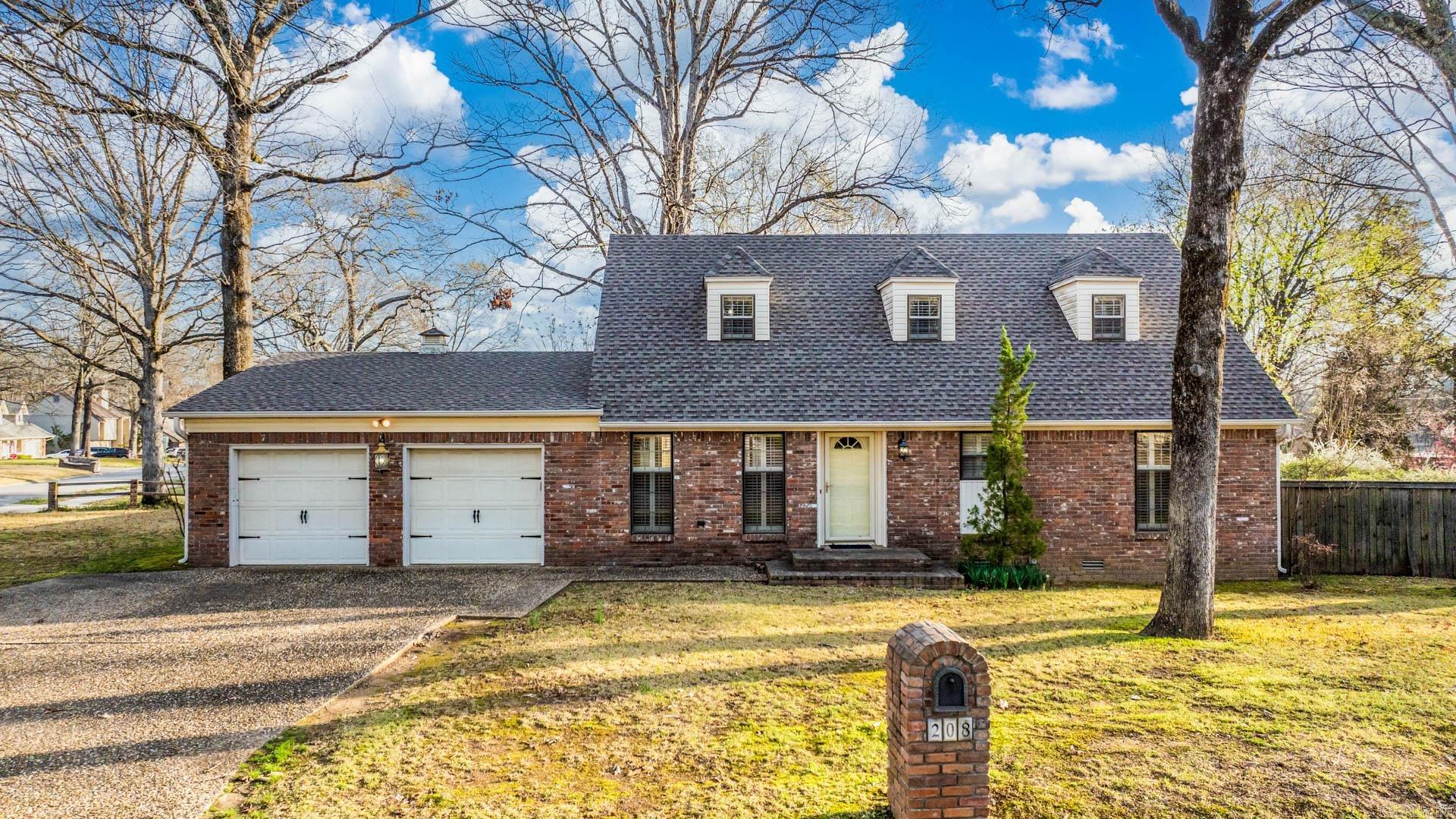 Beautiful brick home on large, level corner lot. The kitchen has an abundance of cabinetry, a nice breakfast bar, stainless appliances and double ovens. There is a large laundry room off the kitchen that has space for an extra refrigerator. The main kitchen refrigerator and the laundry refrigerator both stay with the property. Downstairs has a formal dining area that can also be easily used as extra space for the main living area. Two bedrooms downstairs and two bedrooms up. The backyard is fenced and level with a large deck.