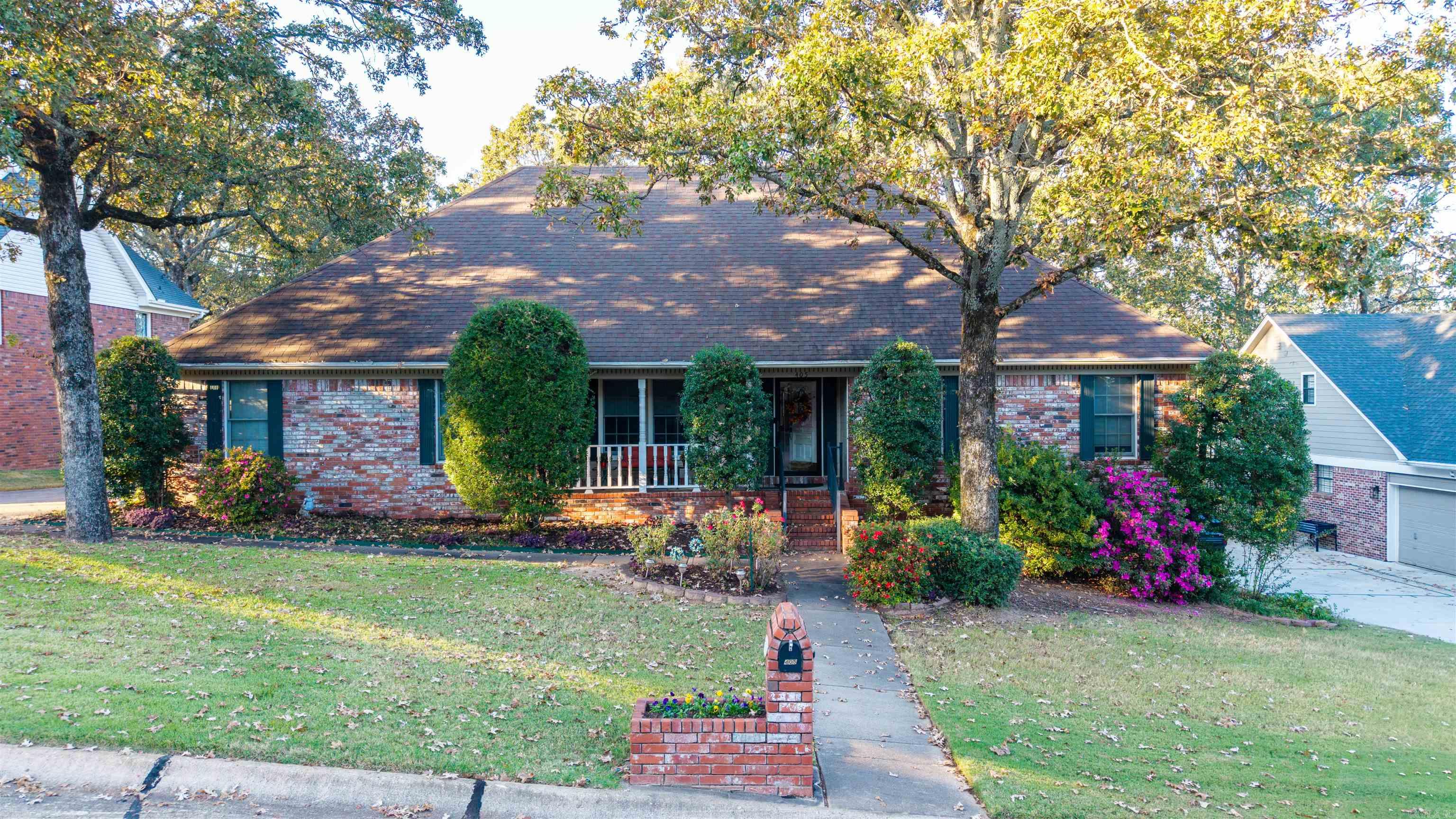 Welcome to this beautiful one-level home in the sought-after Overbrook subdivision. The split floor plan offers four bedrooms and two bathrooms, designed for comfort and flexibility. The primary suite and a nearby guest room are located on one side of the homeāperfect for a nursery or home officeāwhile two additional bedrooms are privately situated on the opposite side. The primary suite features a spacious dressing area, walk-in closet, double vanity, jetted tub, and separate shower. The eat-in kitchen is the heart of the home, complete with granite countertops, oak cabinetry, stainless steel appliances, and a convenient island. The large great room offers plenty of space for gathering and includes a cozy gas-log fireplace. A formal dining room provides additional space for entertaining. The guest bathroom includes a double vanity and linen closet, and every bedroom has a walk-in closet for exceptional storage. The oversized garage includes a storage room, and the walk-in crawlspace adds even more flexibility. Enjoy peaceful mornings on the front porch or relax on the back deck overlooking the yard. This home combines function, space, and comfort in one inviting package.