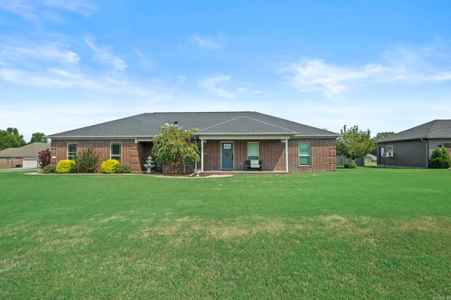 You are going to Fall in Love with This Home! This stunning property sits on over an acre and offers everything you've been dreaming of- an in-ground pool,hot tub,shop,storm shelter, and so much more! Step inside to find a home that has been completely updated from top to bottom. Recent upgrades include a new roof, newer HVAC system , and high end appliances such as a Viking Convection cooktop, Bosch double ovens, and a built in refrigerator (that conveys with the home), The garage features a storm shelter for peace of mind , plus a a second detached garage/shop with full concrete drieway. Out back you'll feel like you've arrived at a private resort. The 15X33 ingroound pool boast a new liner and a new pump motor with a diving board complimented by a relaxing hot tub and pergola. To top it off, the patio has been finished with custom reflective cool paint designed to keep surfaces up to 15 degrees cooler underfoot!  This home has it ALL!  schedule your tour today