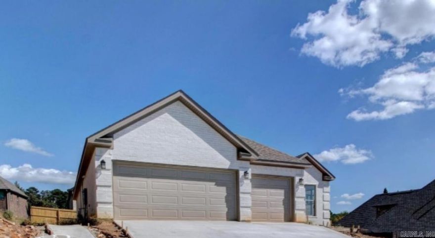 Stunning new construction home on a beautiful lot in Maumelle’s sought-after Majestic Pointe subdivision. Enjoy elegant details and modern comfort throughout, including a formal dining room with picturesque views of Pinnacle Mountain. The open-concept design features a spacious living area with a cozy gas-log fireplace and a gourmet chef’s kitchen boasting an abundance of cabinetry, quartz countertops, stainless steel appliances, a large walk-in pantry, and an island with a breakfast bar plus additional kitchen dining space. The primary suite offers a luxurious retreat with a spa-inspired bath showcasing dbl sink vanities, a custom-tiled walk-in shower, and a relaxing soaking tub, along with separate generous walk-in closet. Two separate guest bedrooms share a full bath, and the home also includes a dedicated laundry room. Thoughtful finishes include beautiful trim work and luxury vinyl plank flooring throughout. Additional highlights: a 3-car garage, floored attic for extra storage, and a covered patio overlooking the backyard. Don’t miss this incredible opportunity! (See agent remarks.)