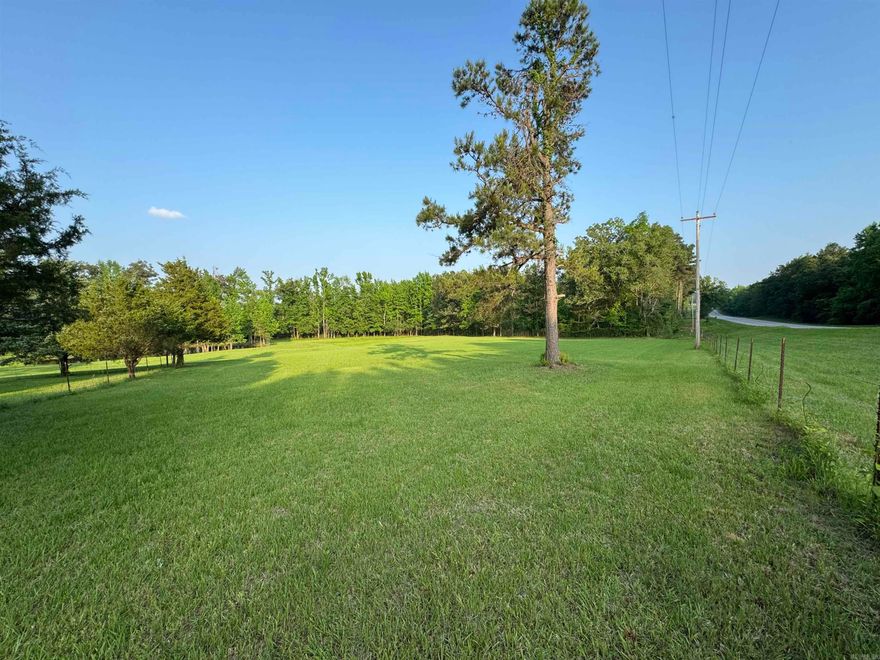 5.23 acre field with a pond. Beautiful site for a home or mobile home. Convenient location just north of Monticello.