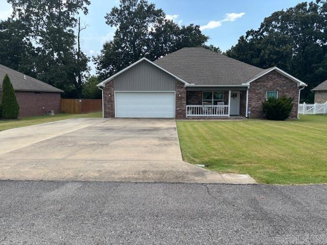 Location, Location, Location!! Open floor plan with cathedral ceiling in LR, this 3 bedroom 3 bath home is close to shopping & restaurants, and minutes from Greers Ferry Lake, Little Red River, and Heber Springs Community Center. There are 2 master baths which have been recently remodeled with walk-in showers in both master baths (10/24 & 1/25). Kitchen features granite counter tops, stainless appliances, lots of cabinets, beer and wine built in refrigerators. Sun Room is currently used as craft room but could easily be transformed into a dining room, with the built in cabinets, and a pass thru window. Has covered back patio. Garage has built in stainless steel shop cabinets with stainless work surface. All appliances stay! Extra wide driveway for parking. Security cameras outside. Keyless entry, alarm system. Call your agent to see this home today!!