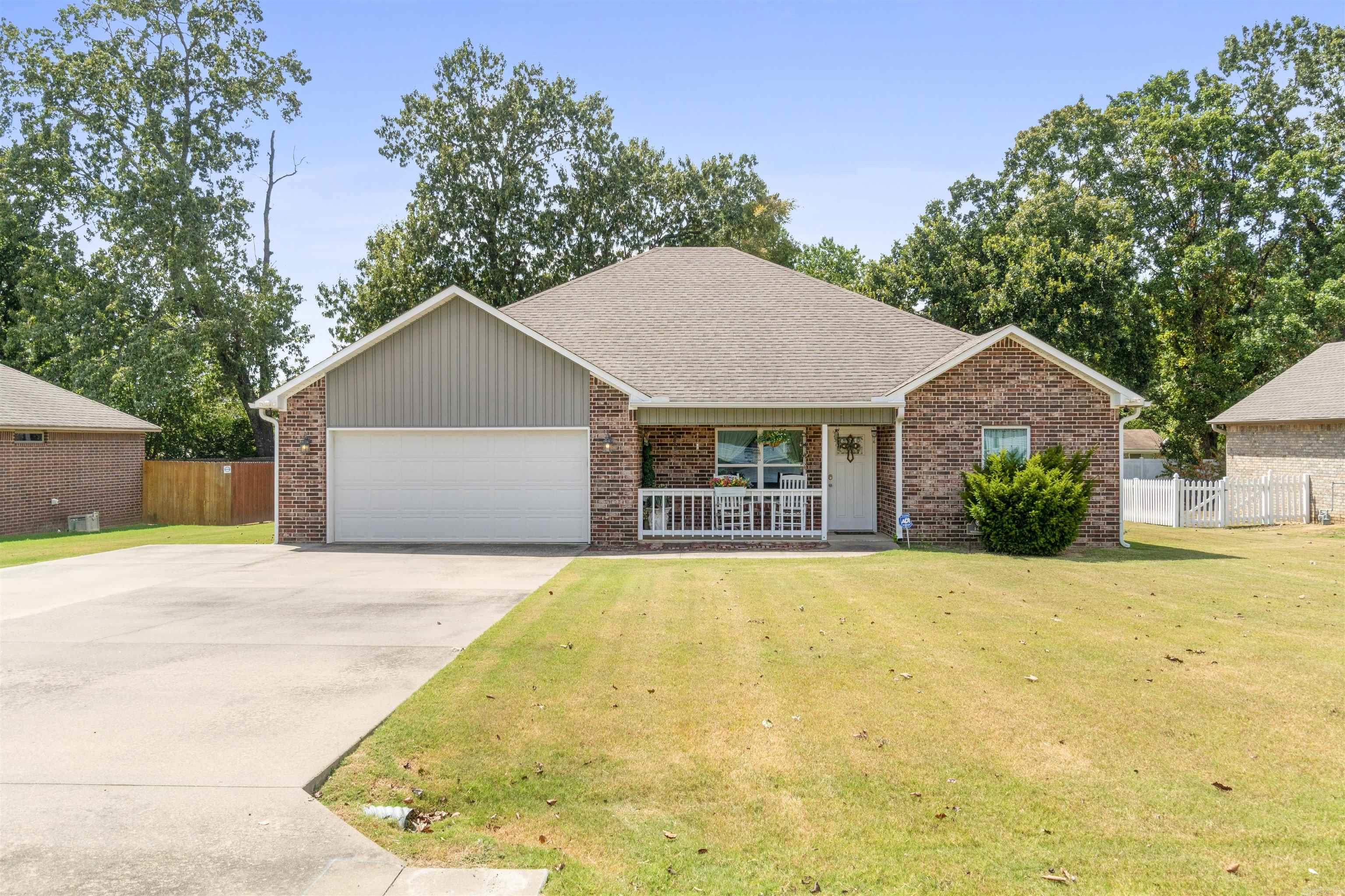 Location, Location, Location!! Open floor plan with cathedral ceiling in LR, this 3 bedroom 3 bath home is close to shopping & restaurants, and minutes from Greers Ferry Lake, Little Red River, and Heber Springs Community Center. There are 2 master baths which have been recently remodeled with walk-in showers in both master baths (10/24 & 1/25). Kitchen features granite counter tops, stainless appliances, lots of cabinets, beer and wine built in refrigerators. Sun Room is currently used as craft room but could easily be transformed into a dining room, with the built in cabinets, and a pass thru window. Has covered back patio. Garage has built in stainless steel shop cabinets with stainless work surface. All appliances stay! Extra wide driveway for parking. Security cameras outside. Keyless entry, alarm system. Call your agent to see this home today!!