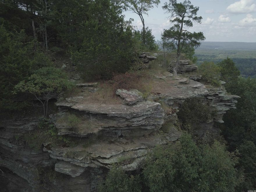 Unleash Your Adventurous Spirit on this 9.52 Acres for Extreme Hiking and Climbing!  Embark on the ultimate adventure and challenge amidst nature's raw beauty of untamed nature waiting to be conquered.   Ready for development, but heavy equipment work and clearing are needed to shape this rugged terrain to your vision! Schedule your showing today!