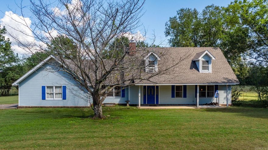 House sits on a Beautiful setting of 5 acres, shop, barn and built-in swimming pool. This 3 bedroom 2 1/2 bath home, has a family room with a cozy woodburning fireplace, great room. Primary bedroom down w/ extra closet space. Home has covered back porch and a 2 tier deck, around the in-ground pool, with covered patio 40X40 shop w/apartment & bath perfect for in-law quarters, 4 stall barn. Endless Possibilities! Perfect Country living!