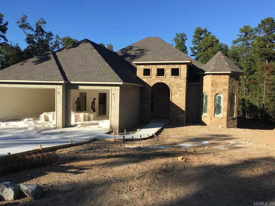 Exquisite new home in prime location! 3 Car Garage... Grand entry into bright open great room, kitchen and eat-in area... Separate formal dining room... Beautiful master bedroom with fireplace... Elegant master bath with custom designed walk-in shower and extra large walk-in closet... Laundry room with sink... Nice covered patio overlooking quiet green space!