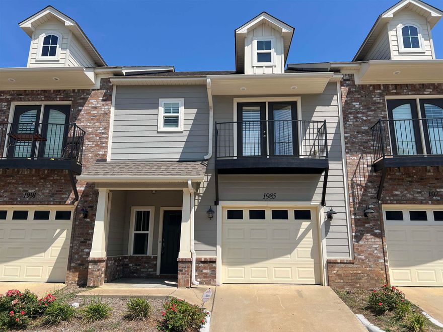 Spacious and luxurious town home located near all restaurants and necessities. Craftsman style unit that consist of 3 bed, 2.5 bath, and a single car garage. Upgraded amenities include private balconies, open floor plans, hardwood, tile, and carpet, granite counter tops, electric fireplace, walk in closets, tile showers, and a breakfast bar. All lawn care is included in rent.  $35.00 application fee. Income requirement is 3 X the monthly rent.