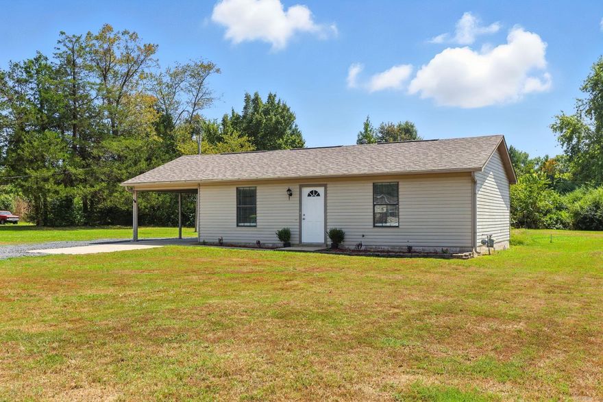 If you're looking for low maintenance, move in ready home - then here you are! This perfect starter home with an open concept floor plan has a new roof, new HVAC, new water heater, new disposal, stainless appliances (fridge stays!), fresh landscaping and brand new paint, an attached carport & an updated bathroom w/ granite just waiting on it's new family. All sitting on a huge 1/2 acre lot. VA/FHA/RD welcomed. You don't want to miss this one....