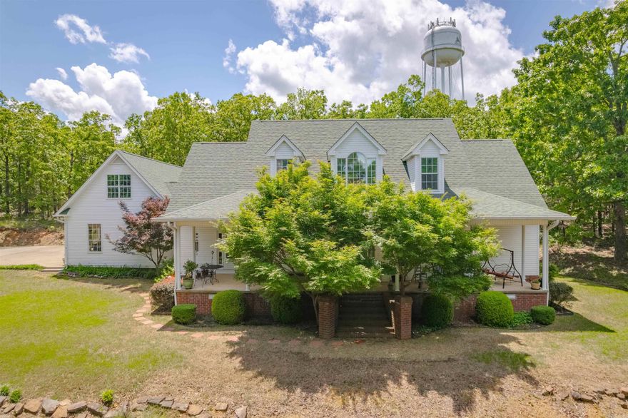 Welcome to this exquisite 2-story home, showcasing 2,900 square feet of beautifully maintained living space nestled on a 5-acre lot. This property epitomizes comfort and elegance with its tall ceilings and an abundance of natural light streaming through expansive windows. The home boasts four bedrooms and two and a half bathrooms, ideal for family living and entertaining guests. The thoughtful layout includes a large bonus storage room located above the garage, offering versatile use for your storage needs or as a creative space. Every inch of this home has been meticulously maintained, ensuring a ready-to-move-in experience that will allow you to immediately enjoy the serene surroundings. This property is a true sanctuary, combining the best of indoor and outdoor living, promising a lifestyle of tranquility and convenience. Agents, see remarks.