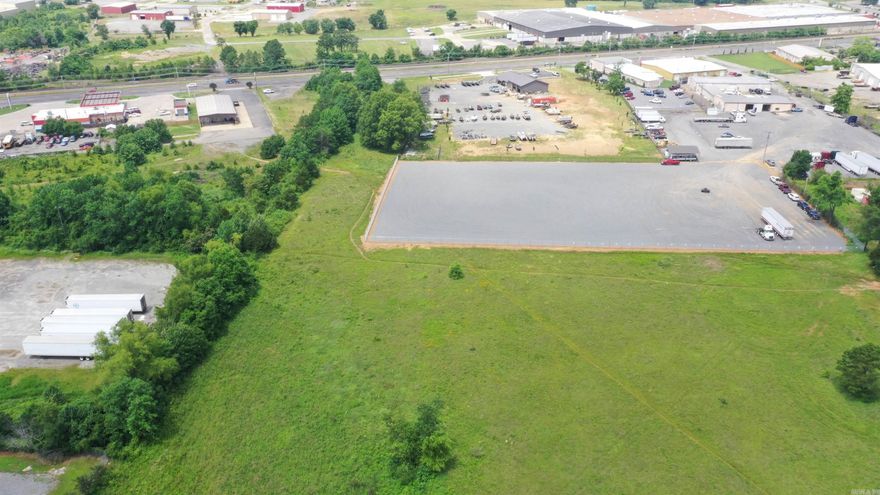 This property has many possibilities for commercial development.  Great place for Storage units for Boats or RV,  large construction companies, trucking companies, etc.  It is conveniently located only minutes from I-40, hospital, Industrial Park, and downtown area. See survey attached to documents.  Drone pictures available.  Call listing agent for more information