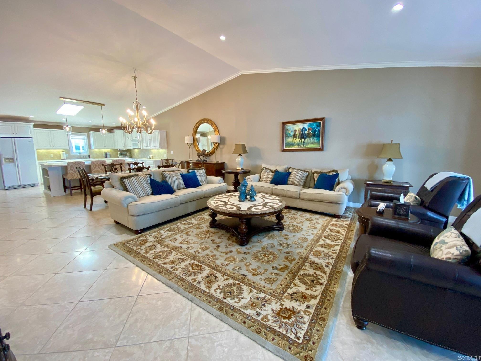 2 Condos for the price of one !!! Fantastic location within a gated community directly on Lake Hamilton. Short Drive to Oaklawn, restaurants and the marina. This unique property offers a 2 bed 2 bath penthouse condo and a 1-bed studio condo, all included in the price. And all exquisite furnishings included! The penthouse is approximately 1800Sq feet with vaulted ceilings, open floor plan and amazing views from the large balcony. Large wet bar, open floor plan and fireplace. The oversized Covered patio with table, BBQ, large sectional offers amazing views of the lake that will not disappoint. A walk in level studio unit on the bottom level with around 400 sq ft., kitchenette & bath. The patio is right on the waters edge. Boat slip with upgraded lift. Community Pool. Min 90 Day Rentals allowed. Many updated have been completed recently included updates to the pool, docks, painted exterior, landscaping, carpet in common areas. Check all what this listing has to offer! A turn key property ! 325 HOA fees include both condos.