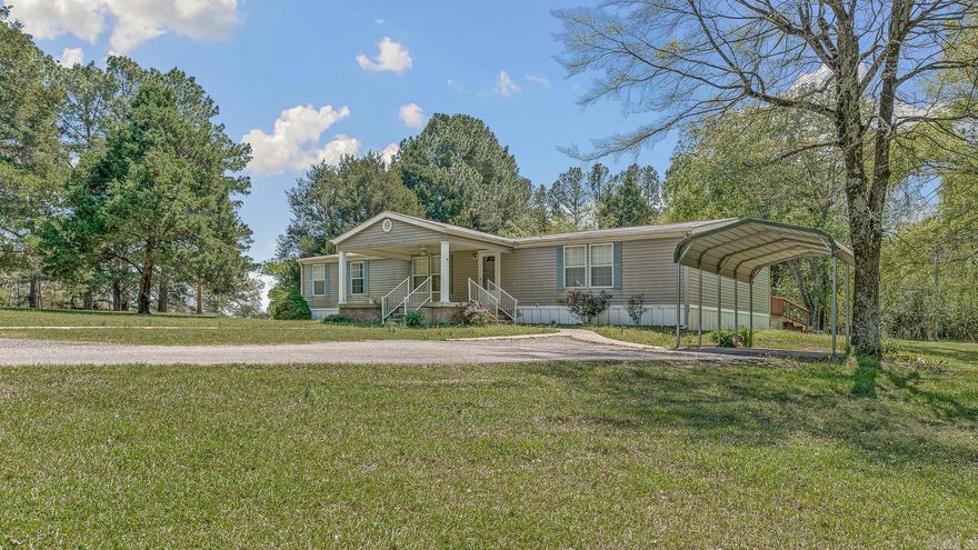 This well-maintained mobile home offers 3 bedrooms and 2 full bathrooms on a spacious 1-acre lot, providing both comfort and room to enjoy the outdoors. The primary suite features a private ensuite bath and a walk-in closet, creating a relaxing retreat. The functional layout includes a comfortable living area and a practical kitchen with ample space for daily living.    Outside, you'll find a detached carport for covered parking and a storage shed in the backyard, perfect for tools or additional storage. With plenty of open space and a peaceful setting, this property offers a great opportunity for affordable living with room to spread out.