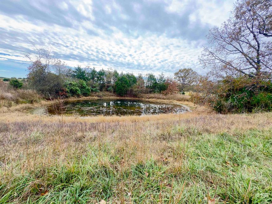 9.5 Acres with Pond & Highway Frontage – Sage, Arkansas  Looking for a change of pace and a place where your imagination can run wild? This newly listed 9.5-acre tract on the peaceful outskirts of Sage, Arkansas, offers the perfect blank canvas for your dream home, cabin, or weekend getaway.  This property features highway frontage, a beautiful pond, electricity available, and a current perc test completed—making it ready for your building plans. Public water is within reach, adding even more convenience.  Enjoy the best of both worlds: a quiet country setting just 3.5 miles from Melbourne Schools and less than 5 miles from town amenities, including shopping, dining, and medical care.  Whether you’re looking to build, farm, or simply relax in the Ozarks, this property offers endless potential and the peace of rural living close to town.  Priced to Sale at $99,000