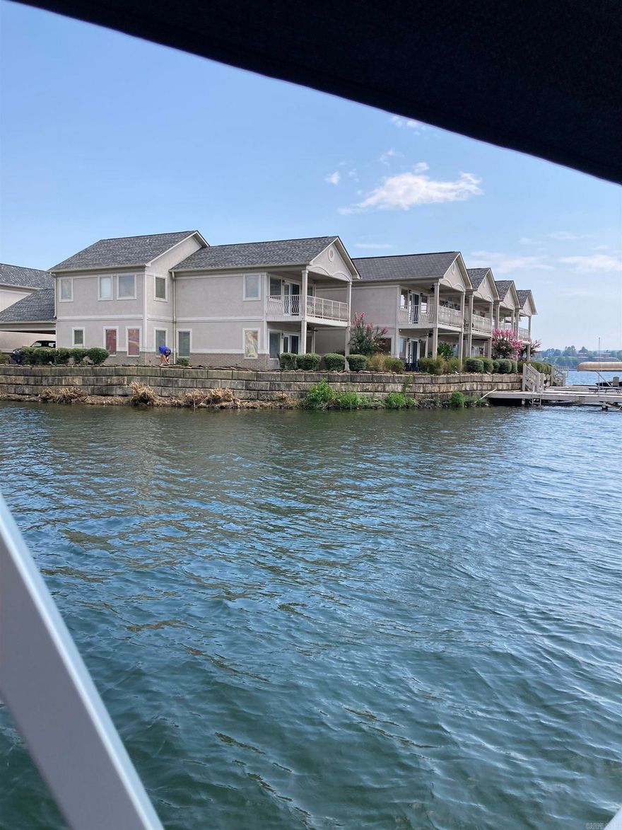 Lakefront 4 bedroom, 3 bathroom condo on Lake Hamilton.  Gated community. Fully furnished, including washer, dryer and propane grill. All utilities included. Boat Dock. 2 covered patios. 2 car carport. Community pool. No pets. Minimum 3 month lease and maximum 6 month lease.
