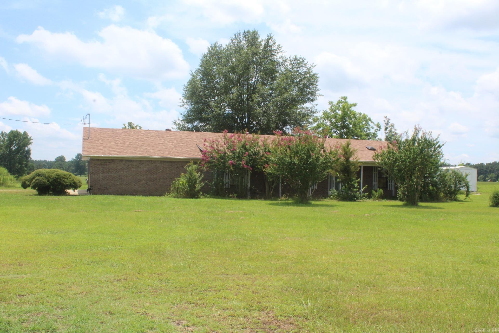 3 Bedroom, 2 full Bath Brick Home with approx. 1560 Sq. Ft. of living space situated on approx 49 acres of pasture land (hay meadow). Kitchen has spacious amount of cabinets / storage. Central A/C & Heat. NEW ROOF. Range & Refrigerator conveys with sell of home. Two car attached garage. 42 x160 pole shed.