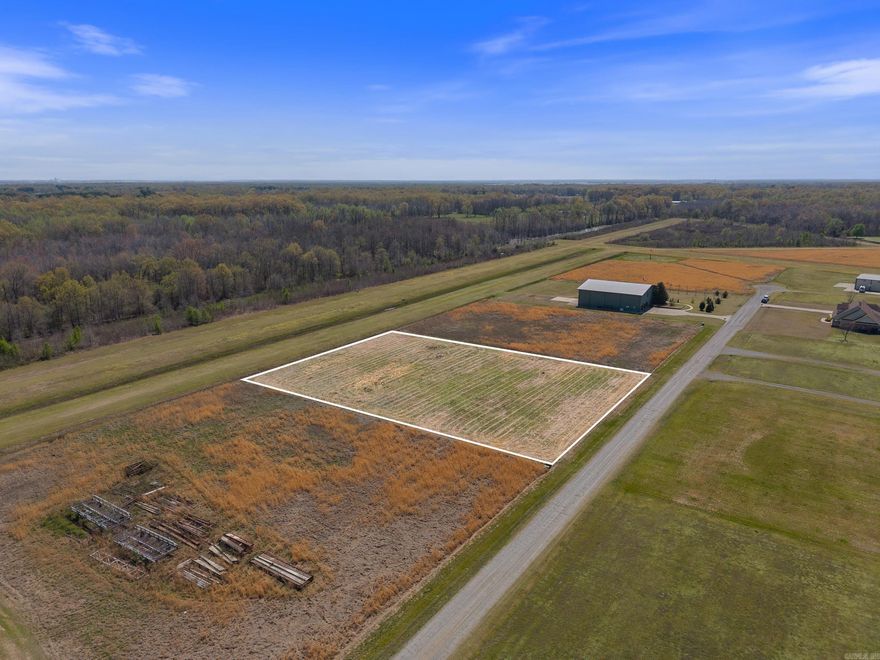 Discover the perfect spot to create your custom Hangar Home at Country Air Estates in Lonoke, Arkansas. Lot 40 is one of only three exclusive runway-frontage properties available, offering direct access to two well-maintained grass runways: Runway 18/36 (3,800 x 100 ft) and Runway 11/29 (2,500 x 100 ft). This flat, level lot comes equipped with water, electric, and a valid perc test, making it ready for your vision. 1.6 acres positioned with its backside along the taxiway, you can seamlessly taxi into your own hangar. Enjoy the convenience of being just 2 minutes from I-40 and a quick 14-minute drive to North Little Rock. Say goodbye to hangar and landing fees—build your aviation haven and see this unique lot for yourself today! Agents see remarks & docs tab for survey.
