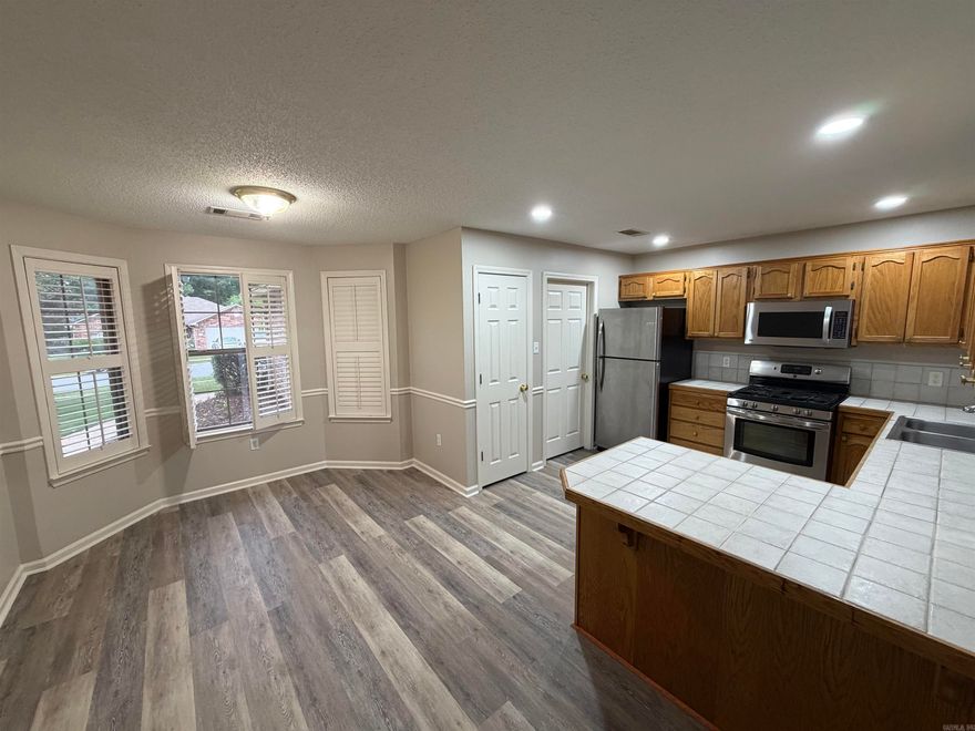 Move-in ready 3 BD/2 BA single-level home in Bryant! This inviting, turn-key single story retreat welcomes you with effortless one-level living, brand-new flooring, and fresh paint. Fall in love with the cozy gas fireplace and bright open kitchen with newer appliances. Relax in your peaceful primary suite with a whirlpool tub. Features a 2023 roof and fenced yard. Superb accessible location in Northridge subdivision near Hwy 5 and schools. More photos to follow.