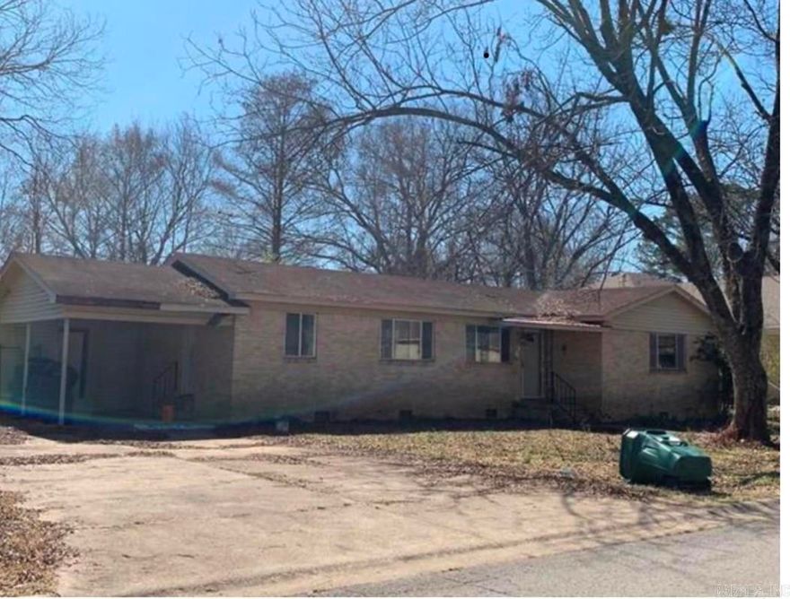 Home is vacant and has been taken down to the studs.  In an up and coming area with nicely remodeled homes in Old Town Conway. Home on two lots.  Great for a flipper or DIY project. Lots zoned for R2.  Sold as is where is. Check it out!