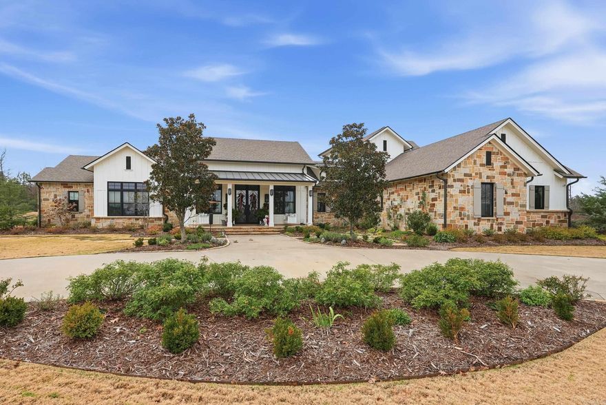 Extraordinary 40-acre gated luxury estate offering privacy, resort-style amenities, and multiple living structures. Built in 2017 and fully remodeled in 2024, this amazing property features exceptional craftsmanship, energy efficiency, and versatility - ideal for a family compound, equestrian estate, or luxury retreat. The 4,959 sq ft main residence offers custom features, hardwood floors, 4.5 baths with en-suite bedrooms, a flexible bonus space, dual laundry rooms, storm shelter, and a spa-like primary suite with heated floors. Screened porches overlook a saltwater pool & spa, perfect for entertaining and private relaxation. The grounds include a stocked 1.5-acre pond, fenced open acreage, and gated entry suitable for livestock or horses. Additional structures include a 3,000 sq ft heated & cooled barn with kitchen & 1/2 bath, event space & workout room. Also included is a barndominium (3700 sq ft, heated & cooled) with finished living quarters, as well as a 40x60 pole barn for storage or equipment. A rare luxury country estate combining modern systems, multiple dwellings, pond, pool, and expansive acreage with turnkey improvements.