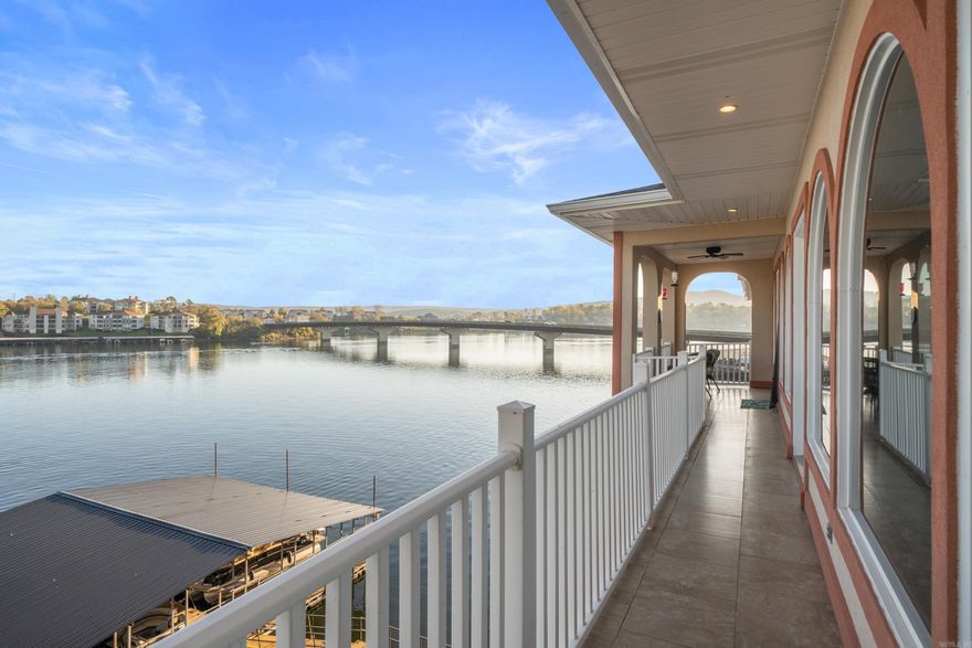 This Lakefront Penthouse condo has a view second to none on Lake Hamilton. No expense or details were spared. From the Gourmet Kitchen with Thermador Appliances to the open kitchen, dining, and living room floorplan. you will fall in love. Selling beautifully furnished. This prime Central Ave. location sets you right on the main channel and is close to all that Hot Springs has to offer. Highly sought  Gated community with Covered parking at your private elevator.