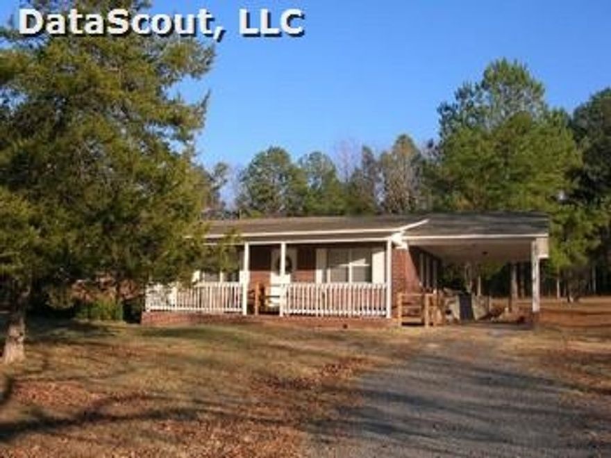Nice clean home across street from lake and just a minutes drive from the lake.  Beautiful yard.  Storm shelter.